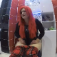 An Eastern-European girl with red-dyed hair farts loudly and repeatedly while sitting on a toilet. She complains (In English) about the smell. Some pooping sounds after 2 minutes into the clip. She shows us her ass when finished. Over 11 minutes.